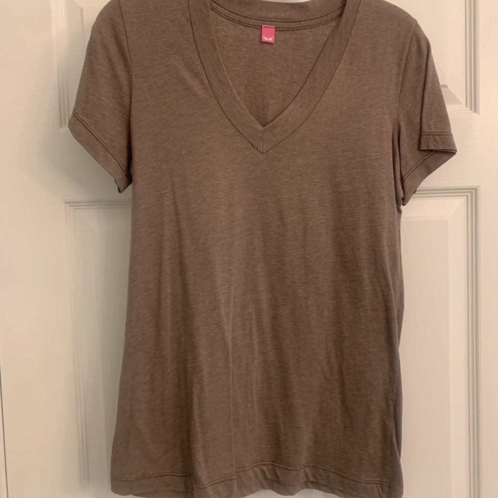V-Neck Short Sleeved Tee Shirt pinhole flaws shown